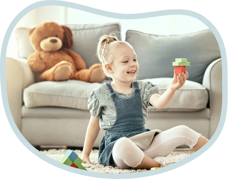A child playing with wooden blocks